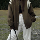 Molly | Casual varsity bunda v retro stylu s pruhovanými detaily na rukávech a žebrovanými manžetami